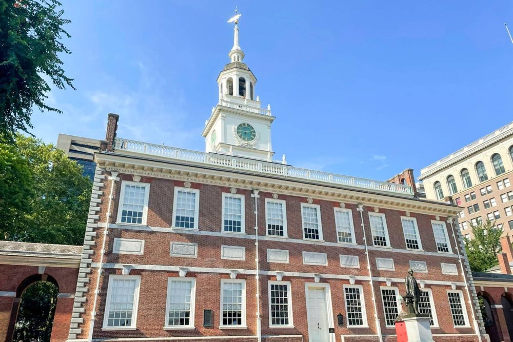 Red-brick Independence Hall in Philadelphia under a clear sky