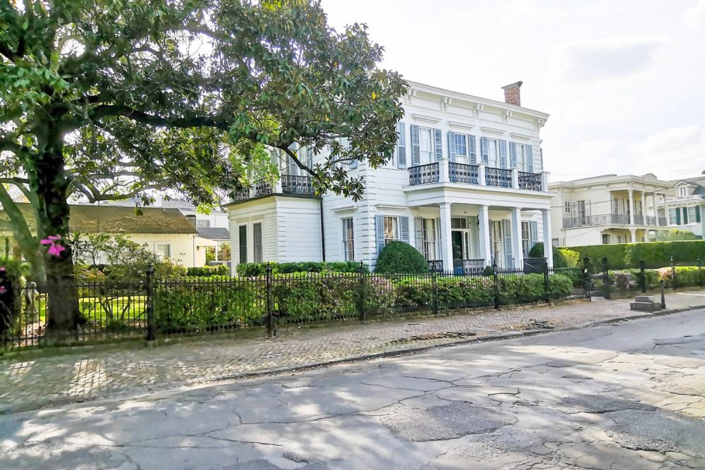 Opulent white home with stately columns in the Garden District